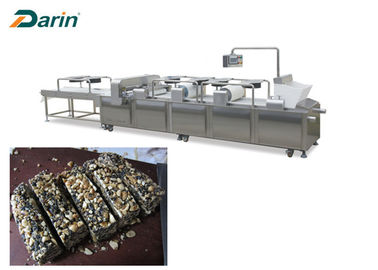 Erdnuss-Stange, die den Müsliriegel Maschinen-Energie-Nahrungs-Stangen-Produktlinie machend schneidet